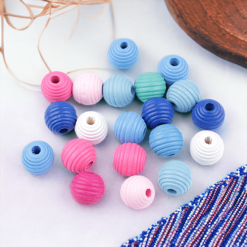Casa si Gradina - Decoratiuni - DIY - Articole mercerie - Set 20 margele din lemn striate Crisalida, diametru 13 mm, nuante albastru si roz - Infinity.ro