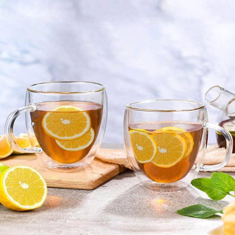 Casa si Gradina - Bucatarie si vesela - Vase pentru gatit - Ceainice si infuzoare - Set ceai, Quasar & Co.®, cu 2 cesti cu pereti dubli,2 farfurioare, 2 lingurite, 2 infuzoare, 250 ml, sticla, transparent - Infinity.ro