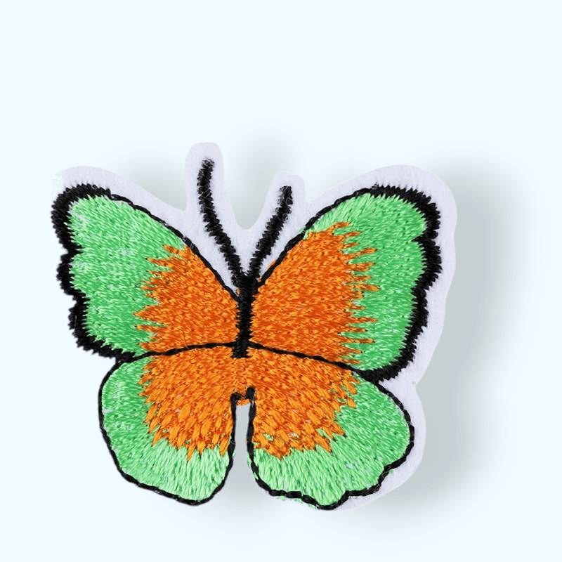 Casa si Gradina - Decoratiuni - DIY - Articole mercerie - Aplicatie termoadeziva brodata, 36 x 40 mm Fluture verde deschis si portocaliu - Infinity.ro