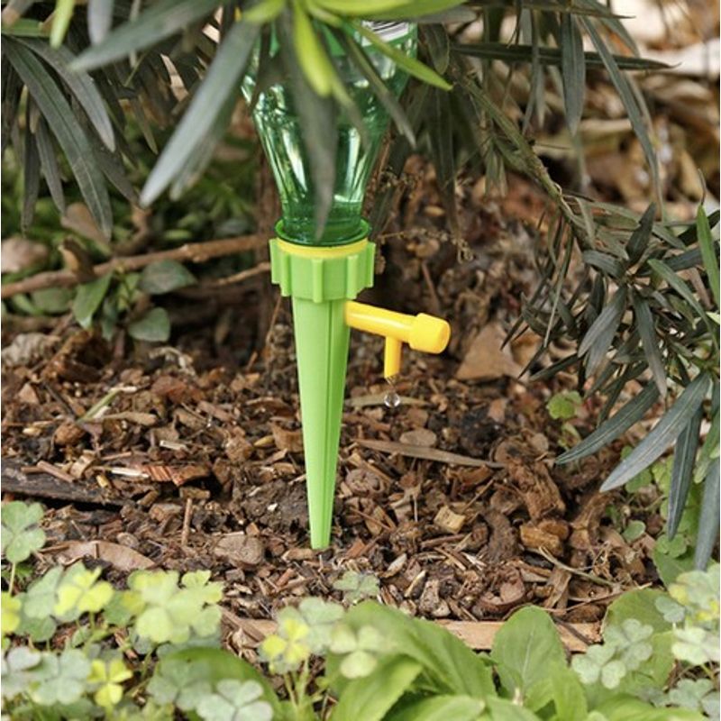 Casa si Gradina - Gradinarit si plante - Instalatii si accesorii pentru irigatii - Accesorii irigare - Dispozitiv de Udare pentru Plante in Ghiveci, Verde, 13,5x3 cm - Infinity.ro