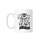 Casa si Gradina - Bucatarie si vesela - Cani si pahare - Cani si cesti - Cana cu mesaj "May love be the heart of this home" 300 ml - Infinity.ro
