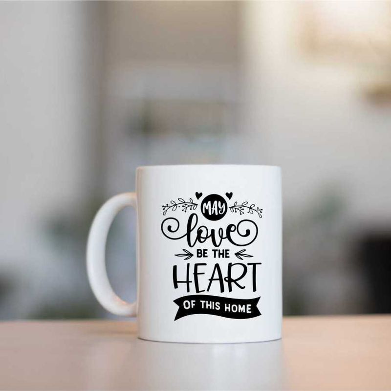 Casa si Gradina - Bucatarie si vesela - Cani si pahare - Cani si cesti - Cana cu mesaj "May love be the heart of this home" 300 ml - Infinity.ro