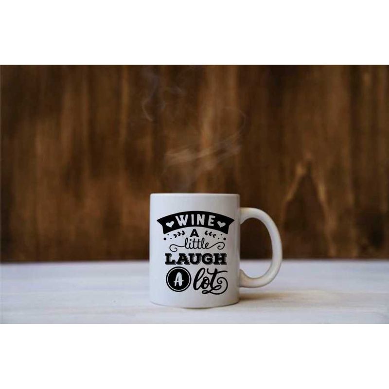 Casa si Gradina - Bucatarie si vesela - Cani si pahare - Cani si cesti - Cana cu mesaj "Wine a little laugh a lot" 300 ml - Infinity.ro