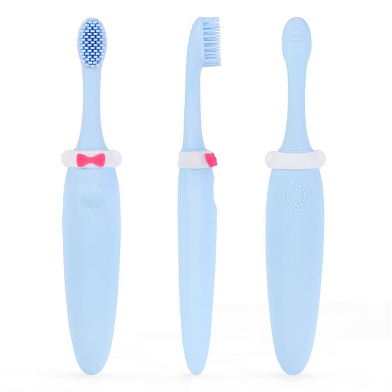 Ingrijire personala si Cosmetice - Igiena dentara - Periute de dinti clasice - Periuta de dinti, din silicon, pentru copii, model cu papion, BPA free, albastru deschis - Infinity.ro