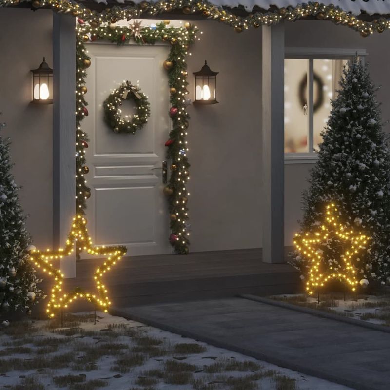 Casa si Gradina - Decoratiuni - Decoratiuni de sezon - Decoratiune stea cu lumini de Crăciun cu tarusi, 115 LED, 85 cm, model cu panglică - Infinity.ro