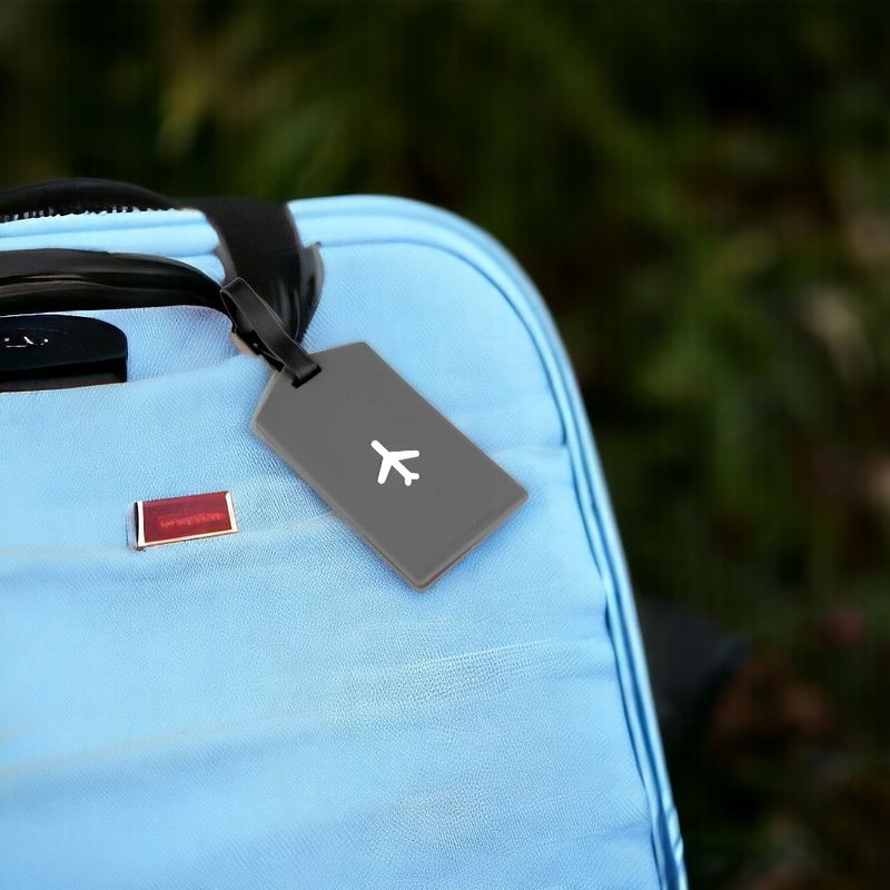 Sport si Outdoor/Articole de voiaj/Accesorii articole de voiaj - Ecuson silicon pentru identificare bagaje Crisalida, motiv avion, 6,5 x 12 cm, Gri - Infinity.ro