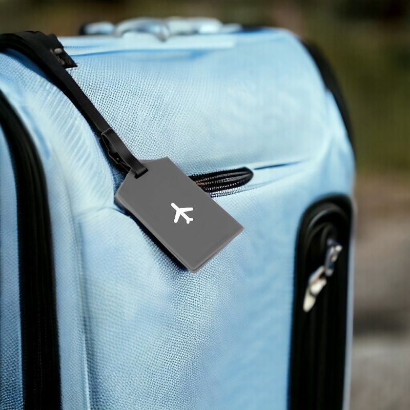 Sport si Outdoor/Articole de voiaj/Accesorii articole de voiaj - Ecuson silicon pentru identificare bagaje Crisalida, motiv avion, 6,5 x 12 cm, Gri - Infinity.ro
