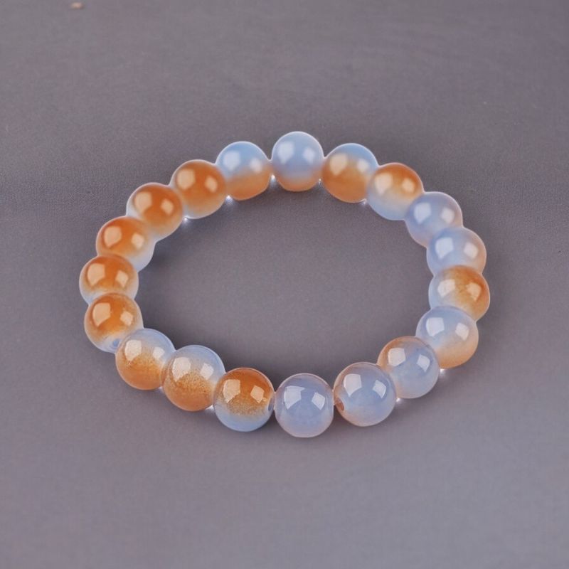 Fashion, accesorii si bijuterii - Femei - Bijuterii femei - Bratari femei - Bratara elastica cu margele de sticla Crisalida, latime 1 cm, bicolora, Maro albastru - Infinity.ro