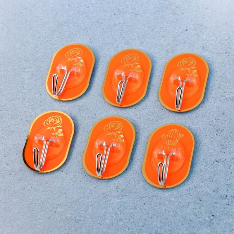 Casa si Gradina - Sanitare - Suporturi si accesorii baie - Accesorii baie - Set 6 carlige metalice autoadezive Crisalida, dimensiune 3,5 x 5,5 cm, Portocaliu auriu - Infinity.ro