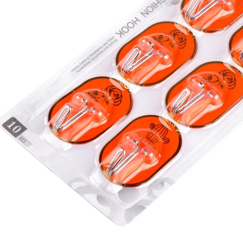 Casa si Gradina - Sanitare - Suporturi si accesorii baie - Accesorii baie - Set 6 carlige metalice autoadezive Crisalida, dimensiune 3,5 x 5,5 cm, Portocaliu auriu - Infinity.ro