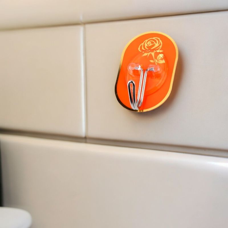 Casa si Gradina - Sanitare - Suporturi si accesorii baie - Accesorii baie - Set 6 carlige metalice autoadezive Crisalida, dimensiune 3,5 x 5,5 cm, Portocaliu auriu - Infinity.ro