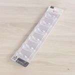 Casa si Gradina - Sanitare - Suporturi si accesorii baie - Accesorii baie - Banda autoadeziva cu 6 carlige din plastic Crisalida, dimensiune 6,3 x 35 cm, Transparent - Infinity.ro