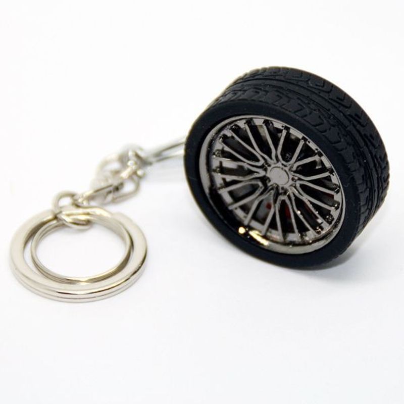 Auto si Moto - Piese auto si accesorii - Interior auto - Accesorii interior - Breloc metalic anticoroziv, model roata auto, Negru - Infinity.ro