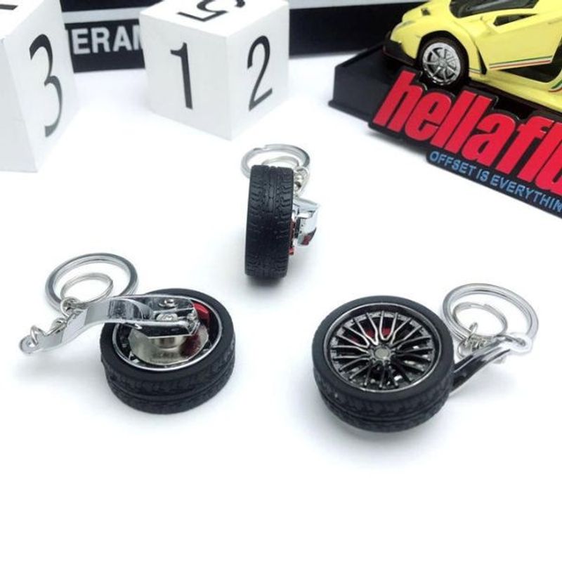 Auto si Moto - Piese auto si accesorii - Interior auto - Accesorii interior - Breloc metalic anticoroziv, model roata auto, Negru - Infinity.ro