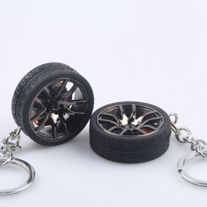 Auto si Moto - Piese auto si accesorii - Interior auto - Accesorii interior - Breloc metalic anticoroziv, model roata auto, Negru - Infinity.ro