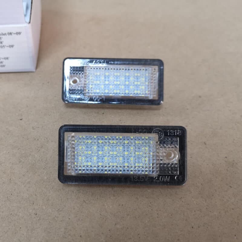 Auto si Moto - Piese auto si accesorii - Caroserie - Faruri, stopuri si proiectoare - Lampi numar led Audi A4 B7, A4 B6, A6 C6, A3 8P, A8 D3, Q7 - Infinity.ro