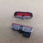 Auto si Moto - Piese auto si accesorii - Caroserie - Faruri, stopuri si proiectoare - Lampi logo portiere VW Passat B6, B7, CC, Golf 5, 6, 7, Touareg - Infinity.ro