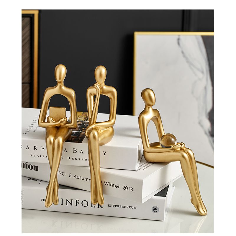 Casa si Gradina - Decoratiuni - Obiecte decorative - Accesorii decorative - Set 4 siluete decorative: thinker, reader, music listener and holding the globe, realizate din rasina, 23cm, auriu - Infinity.ro