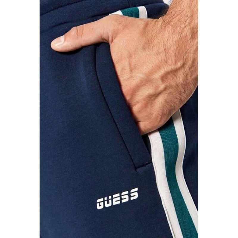 Fashion, accesorii si bijuterii - Barbati - Imbracaminte - Pantaloni barbati - Pantaloni sport Guess cu slituri cu fermoar S INTL Bleumarin - Infinity.ro