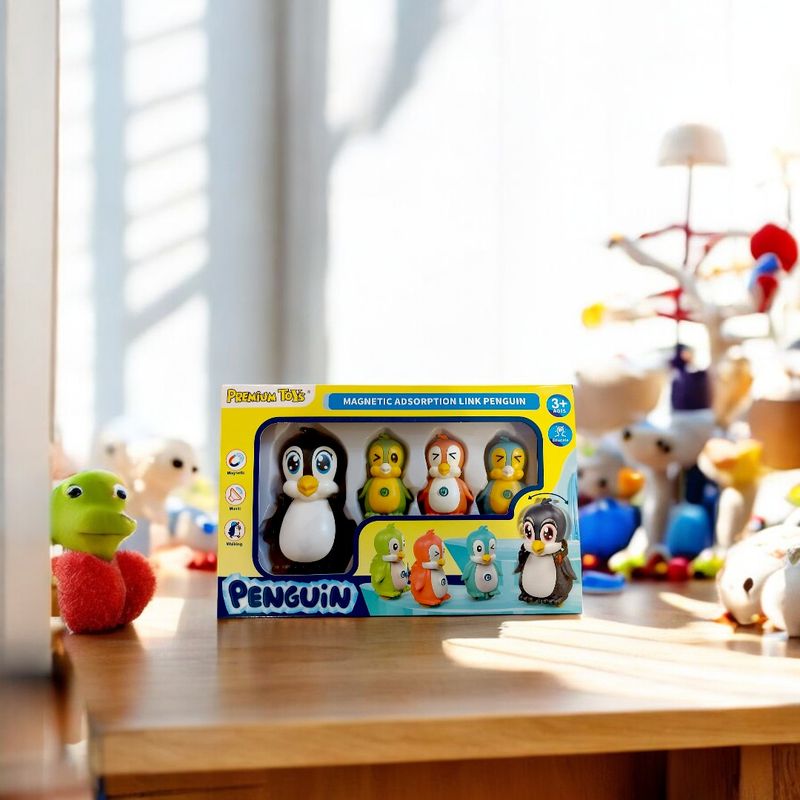 Jucarii, Copii si Bebe - Jucarii si jocuri - Jucarii & jocuri educative - Jucarii interactive - Jucarie magnetica, Famile 4 pinguini, kidsNplay, saltareti si muzicali, multicolor, cu legaturi de absorbtie magnetica, h=11 cm, electric, 3 ani+, magnet atasat pe fiecare pinguin - Infinity.ro