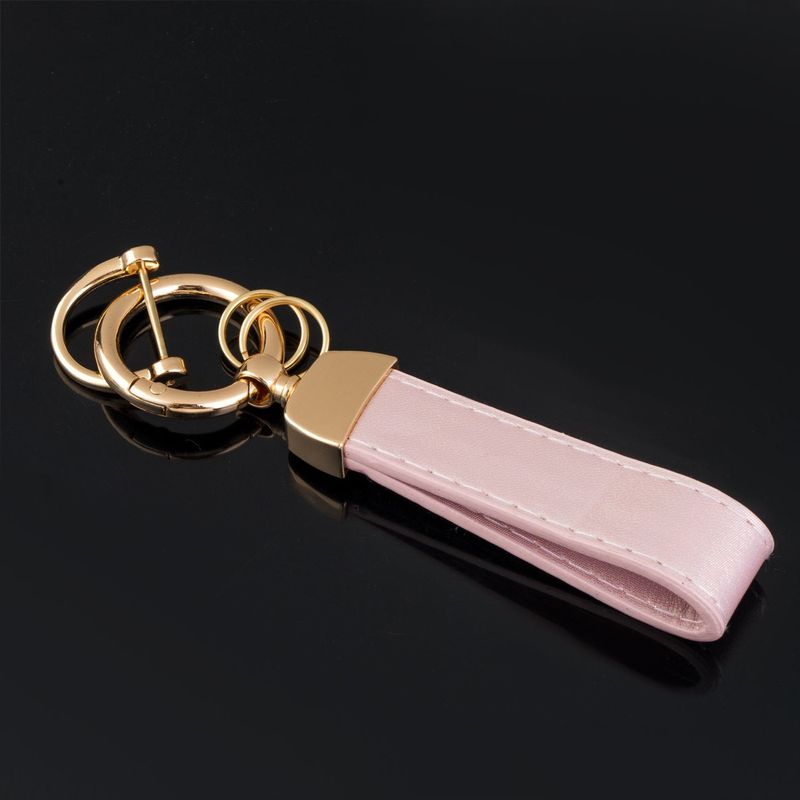 Fashion, accesorii si bijuterii - Femei - Accesorii femei - Alte accesorii femei - Breloc femei, model maner, culoare roz holografic, inel metalic auriu, lungime 12.5cm - Infinity.ro