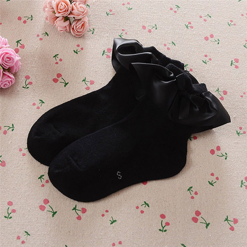 Fashion, accesorii si bijuterii - Copii - Lenjerie si pijamale copii - Sosete si dresuri copii - Sosete cu volan si fundita Drool (Culoare: Negru, Varsta: 6-8 ani) - Infinity.ro