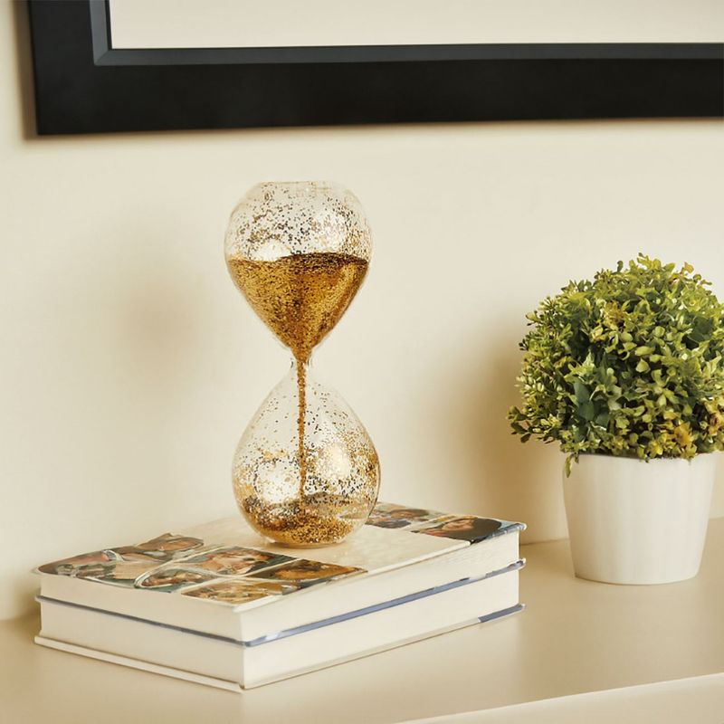 Casa si Gradina - Decoratiuni - Obiecte decorative - Accesorii decorative - Clepsidra decorativa, model 3d, glitter aurie, 5 x 13cm, sticla - Infinity.ro