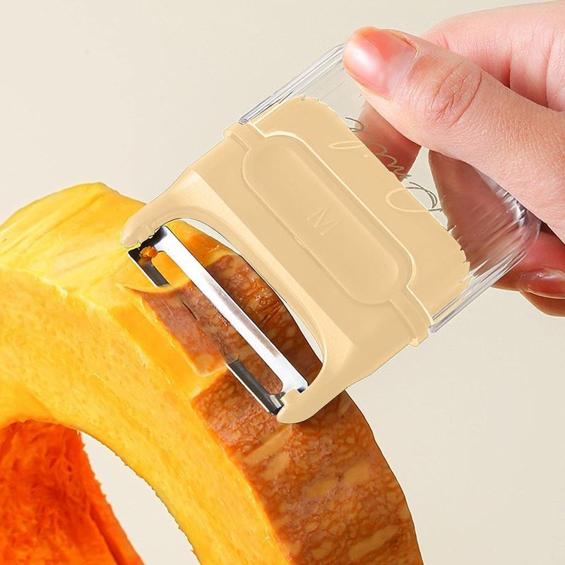 Casa si Gradina - Bucatarie si vesela - Ustensile bucatarie - Razatori si curatatoare - Decojitor/Curatator manual de legume si fructe, Flippy, portabil, cu magnet, doua lame, Inox, Galben, 6.7x6x1.6 cm - Infinity.ro