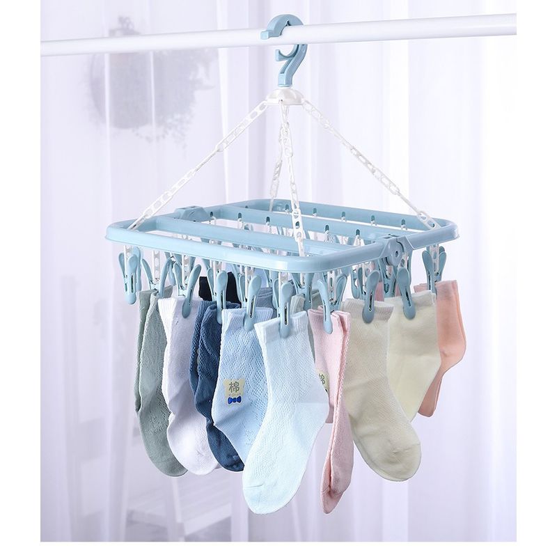 Market - Spalare si intretinere rufe - Uscatoare de rufe si accesorii - Uscator de rufe Flippy, 32 de cleme, Plastic, Pliabil, rotire 360 grade, 32x32 cm, Albastru - Infinity.ro