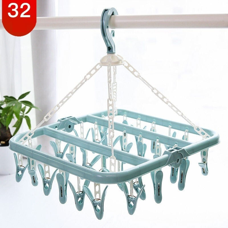 Market - Spalare si intretinere rufe - Uscatoare de rufe si accesorii - Uscator de rufe Flippy, 32 de cleme, Plastic, Pliabil, rotire 360 grade, 32x32 cm, Albastru - Infinity.ro