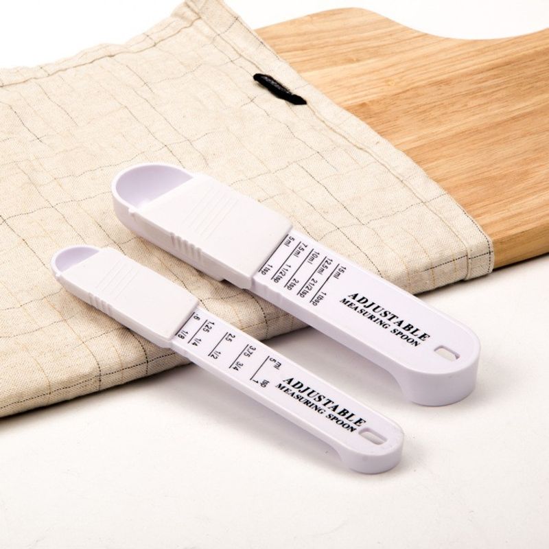 Casa si Gradina - Bucatarie si vesela - Ustensile bucatarie - Polonice, linguri si clesti de bucatarie - Set doua linguri masurare ajustabile Flippy, material ABS, 16x3.5x1.6 cm, alb - Infinity.ro