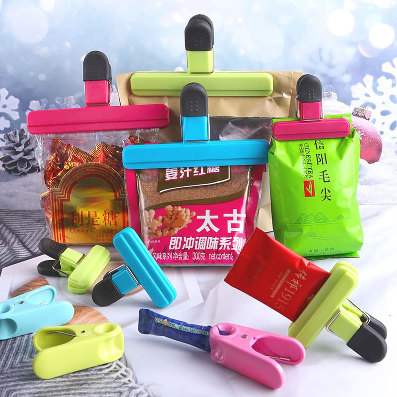 Market - Curatenie si intretinere casa - Produse bucatarie - Pungi si folii alimentare - Cleste Multifunctional pentru Sigilarea Pungilor, Flippy, din Plastic, Mentine Alimentele Proaspete, 15x7.5 cm, Roz - Infinity.ro