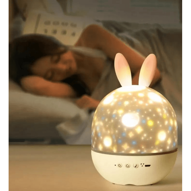 Casa si Gradina - Corpuri si surse de iluminat - Veioze si lampi - Lampi de veghe copii - Lampa de noapte muzicala, de veghe, pentru copii, Danex, telecomanda, proiector, sunet alb, rotativ cu 6 filme de proiectie, 8 tipuri de muzica, Iepuras, Alb - Infinity.ro