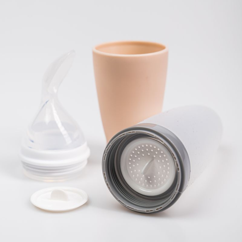 Jucarii, Copii si Bebe - Hrana si alaptare - Biberoane, suzete si accesorii hranire - Cani, pahare si accesorii bebe - Lingurita de silicon cu rezervor Babysnugg, Fara BPA, Portabila, Bej - Infinity.ro