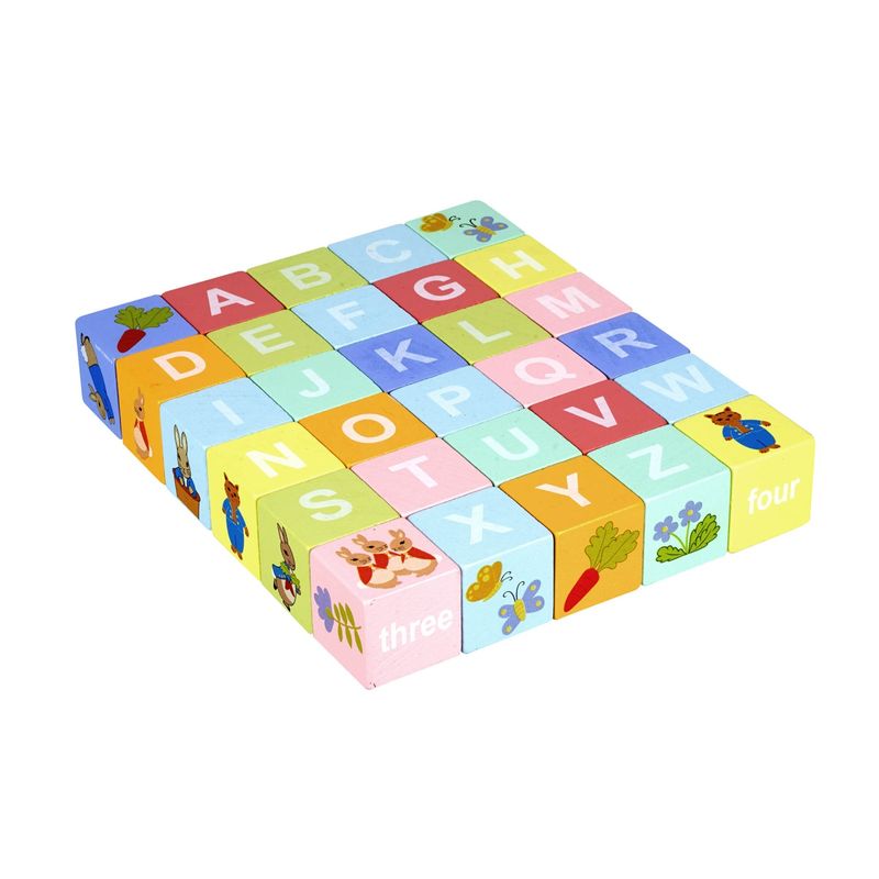 Jucarii, Copii si Bebe - Jucarii si jocuri - Seturi de constructie si cuburi - Cuburi si caramizi - Carucior cu cuburi Peter Rabbit™, Orange Tree Toys - Infinity.ro