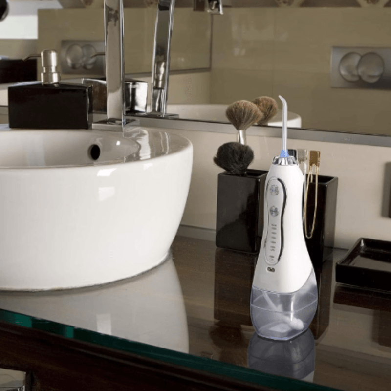 Ingrijire personala si Cosmetice - Igiena dentara - Irigatoare bucale - Irigator bucal profesional, Dus bucal, Adsinio, 8 Capete, 5 Trepte de presiune, Husa transport, Rezervor detasabil, Alb - Infinity.ro