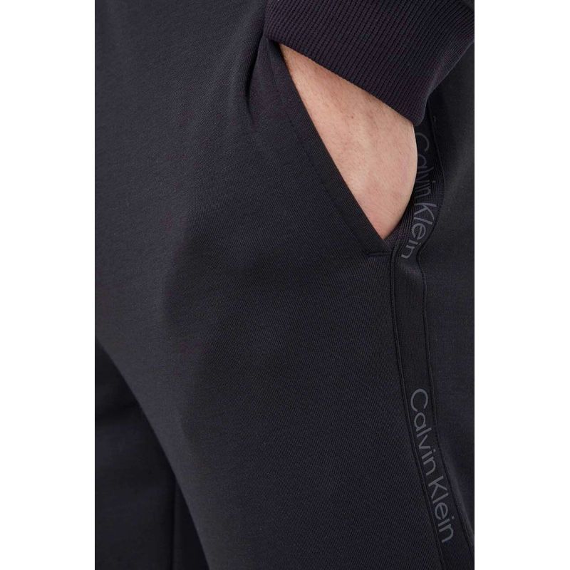 Fashion, accesorii si bijuterii - Barbati - Imbracaminte - Pantaloni barbati - Pantaloni de antrenament Calvin Klein Performance 00GMS4P641, XL INTL, Negru - Infinity.ro