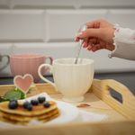 Casa si Gradina - Bucatarie si vesela - Cani si pahare - Cani si cesti - Ceasca cu talpa AMBITION Curly, 250ml, portelan, alb - Infinity.ro