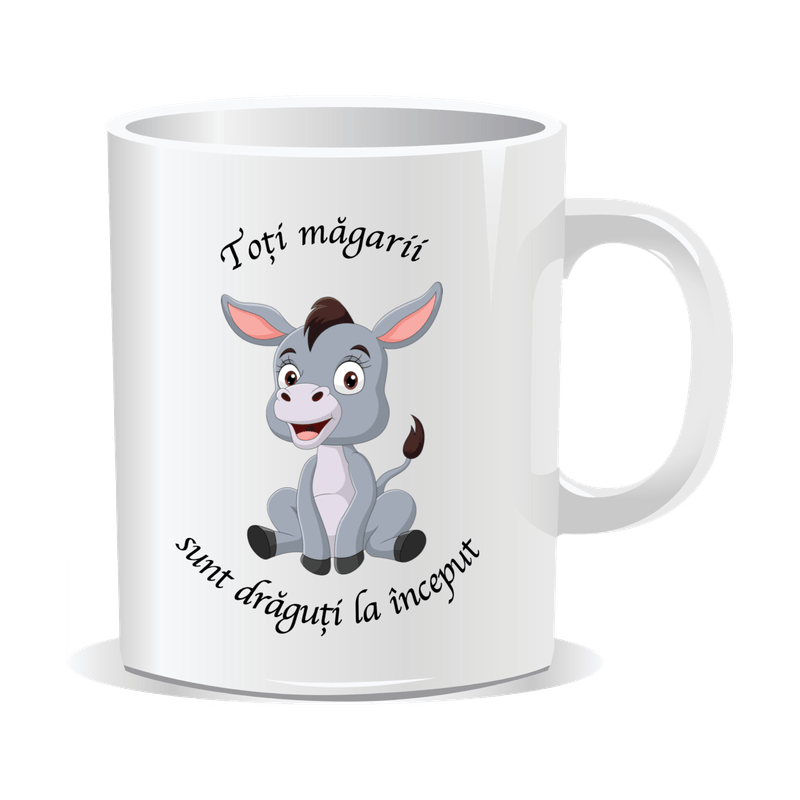 Casa si Gradina - Bucatarie si vesela - Cani si pahare - Cani si cesti - Cana alba personalizata Toti magarusii sunt draguti la inceput, INOVATIX®. 330ml - Infinity.ro