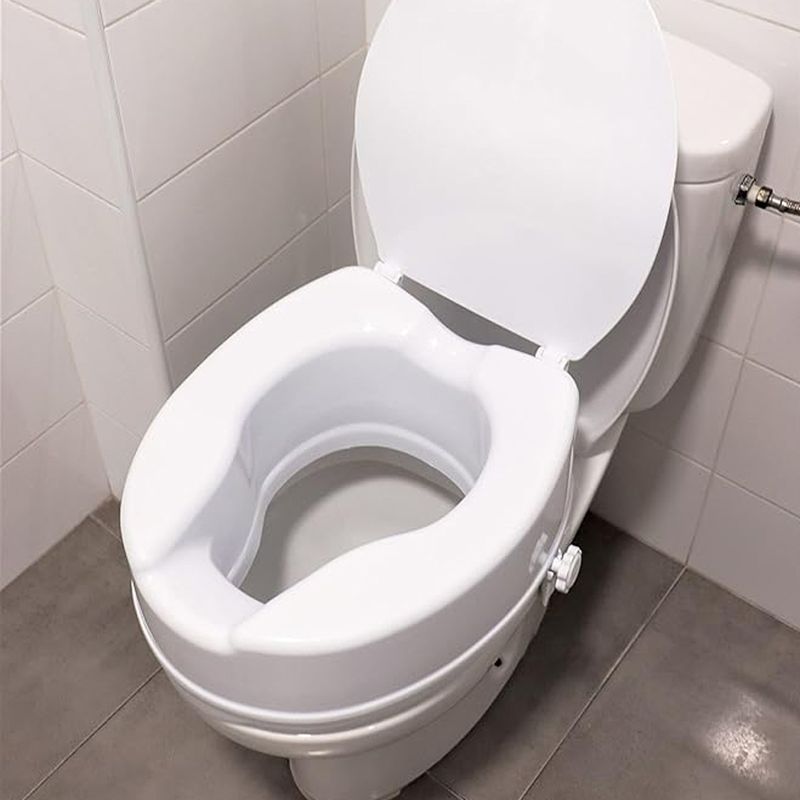 Casa si Gradina - Sanitare - Obiecte sanitare - Accesorii vase de toaleta - Inaltator WC cu capac Linomag®, 15 cm inaltime, Sistem de prindere reglabil pentru vasul de toaleta, Alb - Infinity.ro