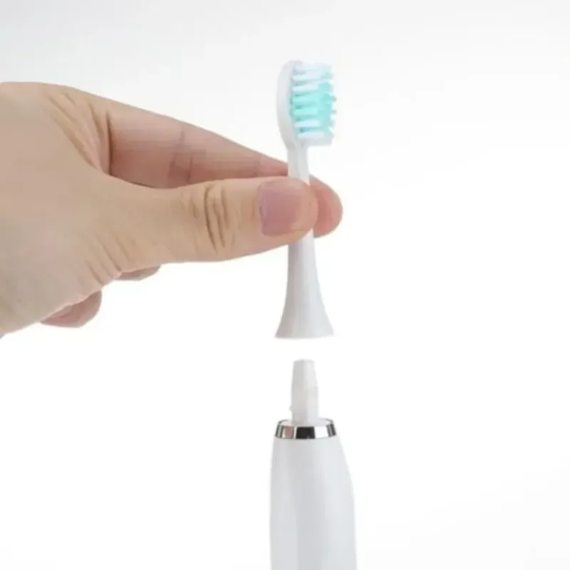 Ingrijire personala si Cosmetice - Igiena dentara - Periute de dinti electrice - Periuta de dinti electrica ABYZ cu 6 capete incluse si incarcare USB Design modern alba pentru o igiena dentara avansata - Infinity.ro