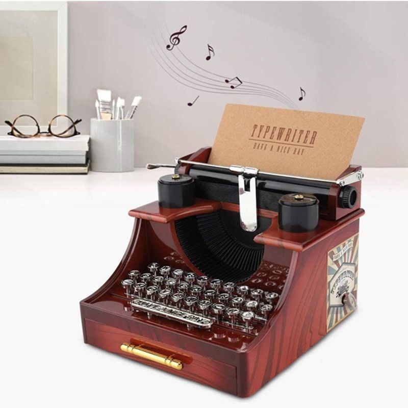 Casa si Gradina - Decoratiuni - Obiecte decorative - Accesorii decorative - Cutie muzicala tip masina de scris, plastic, 14×15×13 cm, maro - Infinity.ro