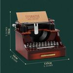 Casa si Gradina - Decoratiuni - Obiecte decorative - Accesorii decorative - Cutie muzicala tip masina de scris, plastic, 14×15×13 cm, maro - Infinity.ro