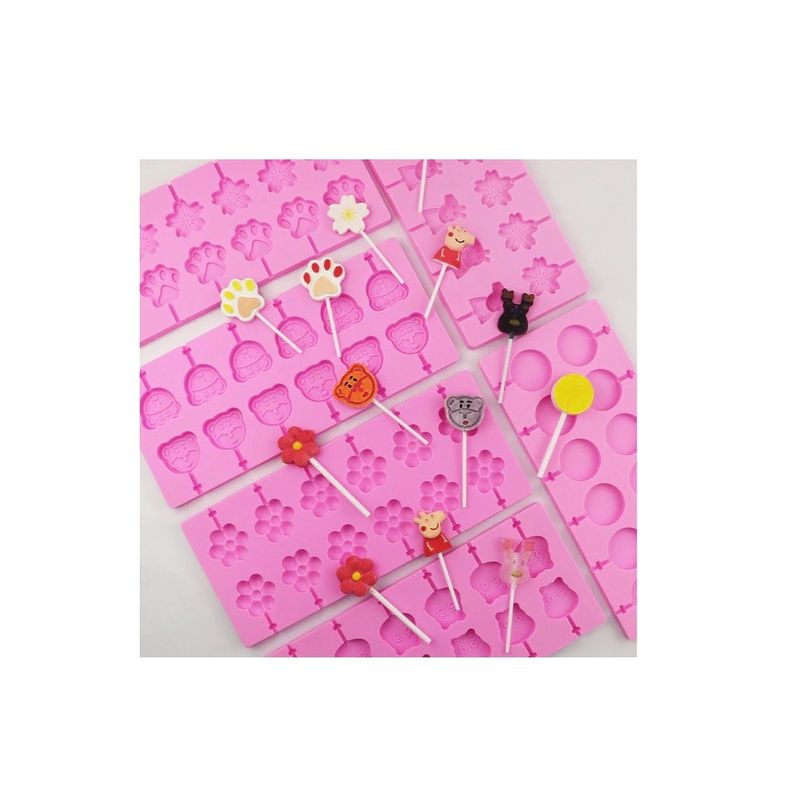 Casa si Gradina - Bucatarie si vesela - Ustensile bucatarie - Forme prajituri - Forma silicon 12 cavitati, Peppa Pig si Dinosaur, Acadele din ciocolata sau Acadele din zahar, Roz, 26 cm, 246COF - Infinity.ro