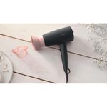 Ingrijire personala si Cosmetice - Aparate & accesorii ingrijire personala - Hair styling - Uscatoare de par - Uscator de par, Philips, 2100 W, Thermo Protect, 3 setari de temperatura, 2 setari de viteza,14 mm, Negru/Roz - Infinity.ro