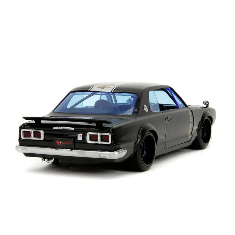 Jucarii, Copii si Bebe - Jucarii si jocuri - Vehicule si jucarii cu telecomanda - Masinute - Set de joaca cu figurina si masina metalica Nissan Skyline GT-R, scara 1:24 cm - Infinity.ro