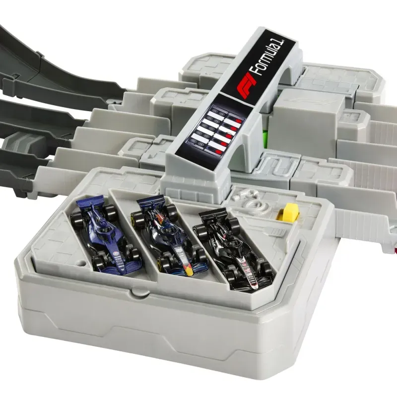 Jucarii, Copii si Bebe - Jucarii si jocuri - Vehicule si jucarii cu telecomanda - Masinute - Hot Wheels Racing Cuircuit De Curse Grand Prix Formula 1 Cu 3 Masinute Incluse - Infinity.ro