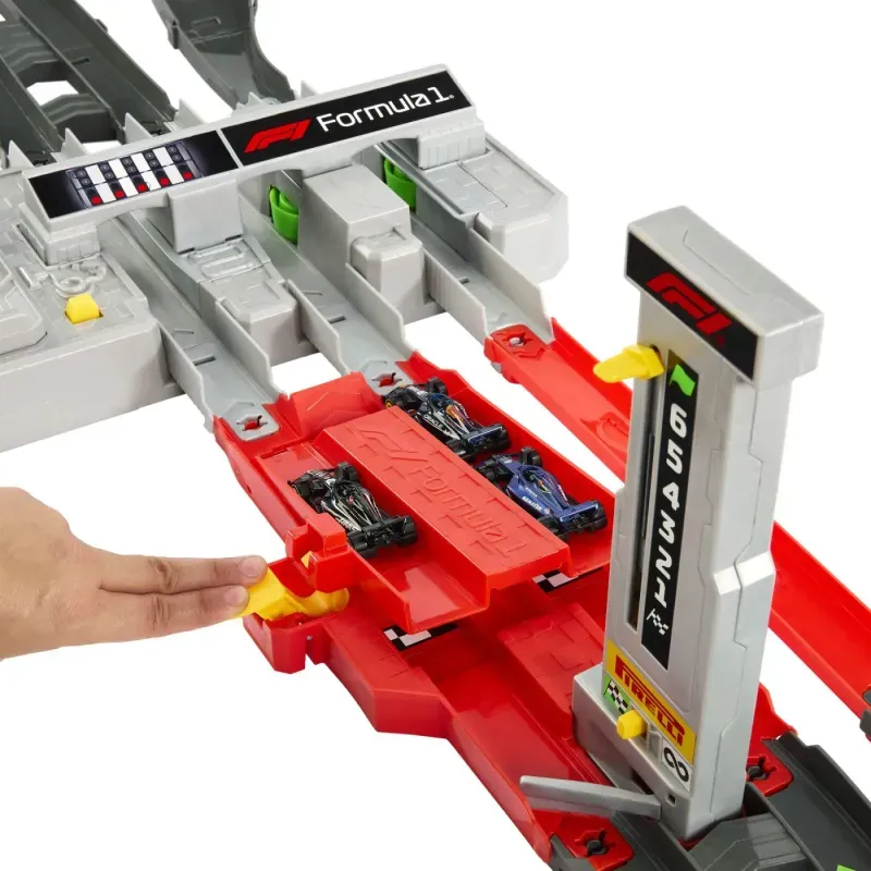 Jucarii, Copii si Bebe - Jucarii si jocuri - Vehicule si jucarii cu telecomanda - Masinute - Hot Wheels Racing Cuircuit De Curse Grand Prix Formula 1 Cu 3 Masinute Incluse - Infinity.ro