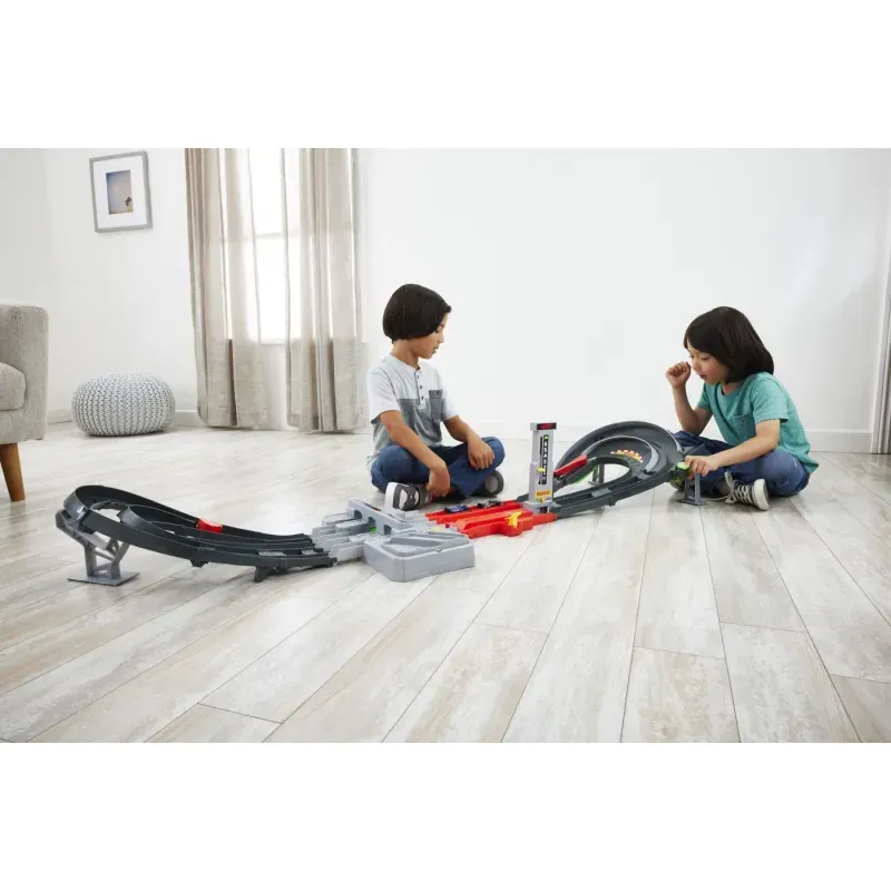 Jucarii, Copii si Bebe - Jucarii si jocuri - Vehicule si jucarii cu telecomanda - Masinute - Hot Wheels Racing Cuircuit De Curse Grand Prix Formula 1 Cu 3 Masinute Incluse - Infinity.ro