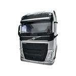 Jucarii, Copii si Bebe - Jucarii si jocuri - Vehicule si jucarii cu telecomanda - Masinute - Macheta Cap tractor Volvo 1:32 V6 6x4 argintiu !!!Atentie oglinda stanga rupta!!! - Infinity.ro